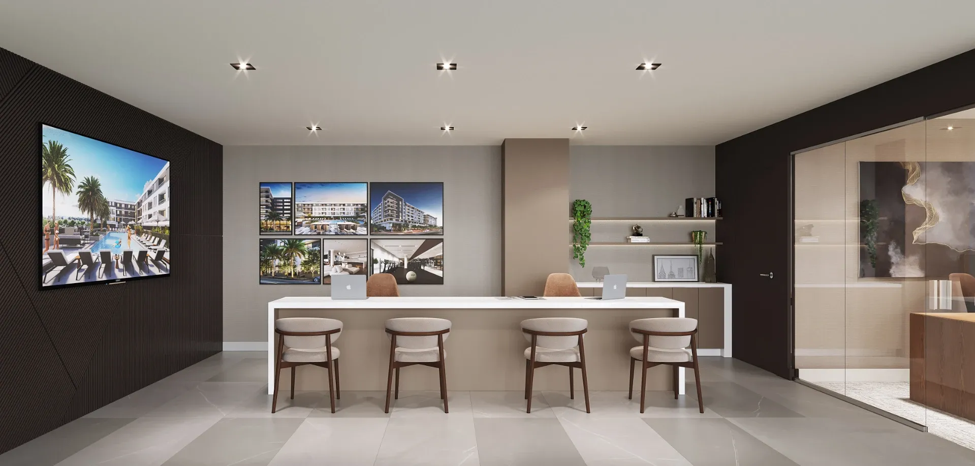 A modern leasing center with a sleek, modern workspace and images of Revv on the wall